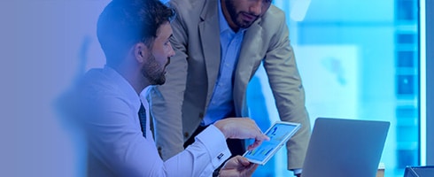 Two business men discussion at computer